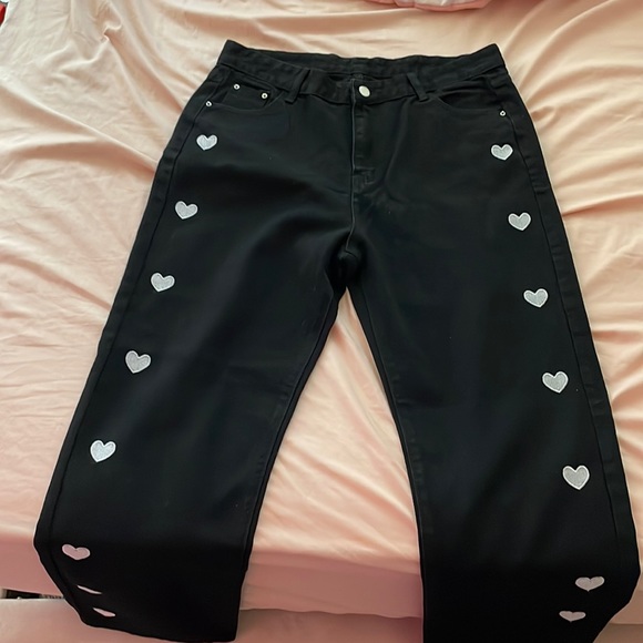 High waisted black pants with white hearts. - Picture 1 of 4